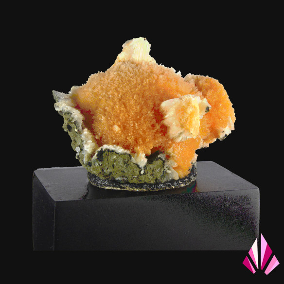 Specimen of orange thomsonite from Poona, India, discovered in 2024.