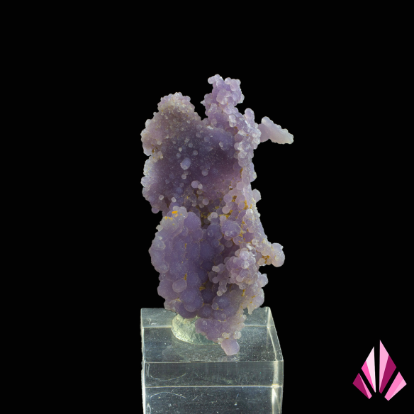 Purple botryoidal chalcedony from Mamuju, Indonesia, displayed on a base.