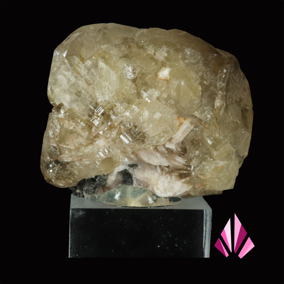 Cerussite from Morocco, rear view of the translucent crystal in pale tones with matrix