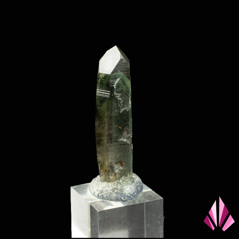 Quartz point with chlorite inclusions from the French Alps, side view of the crystal