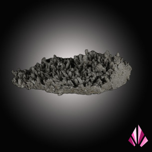 Quartz sprinkled with pyrite and scattered small baryte crystals.