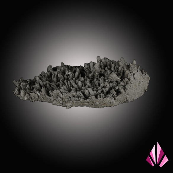 Quartz sprinkled with pyrite and scattered small baryte crystals.