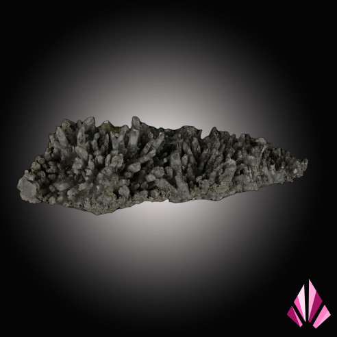 Quartz sprinkled with pyrite and scattered small baryte crystals.