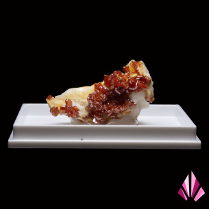Vanadinite on white baryte from the Mibladen region of Morocco.