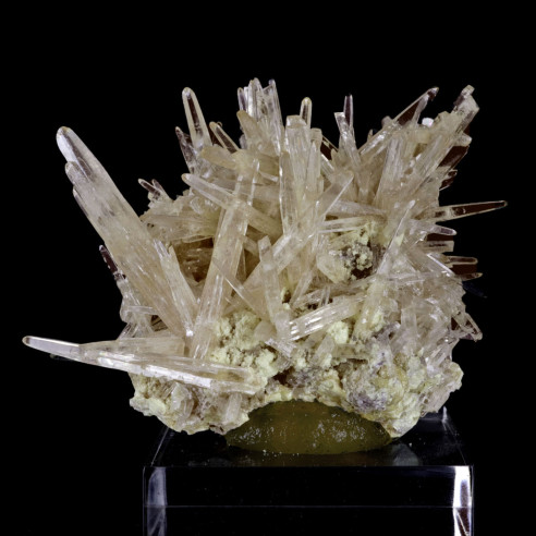 Celestine and Souffre minerals: long, translucent, pale yellow crystals.