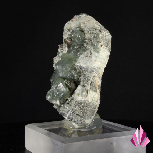 Prehnite from the locality of Saint Christophe with grey crystals.